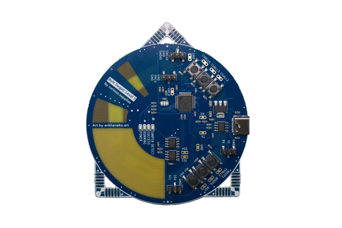 The back side of the target board, showing its components, with an STM32F103 in the middle