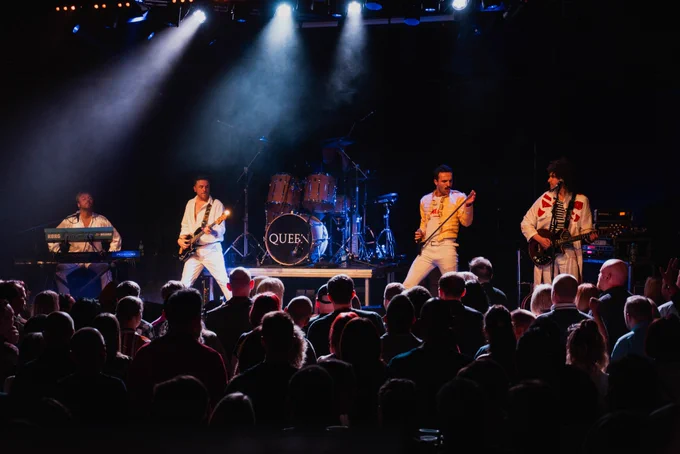 Flash band on stage to a packed crowd