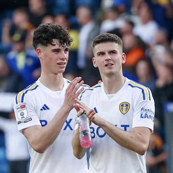 Archie Gray and Sam Byram applaud the Elland Road fans after a recent game