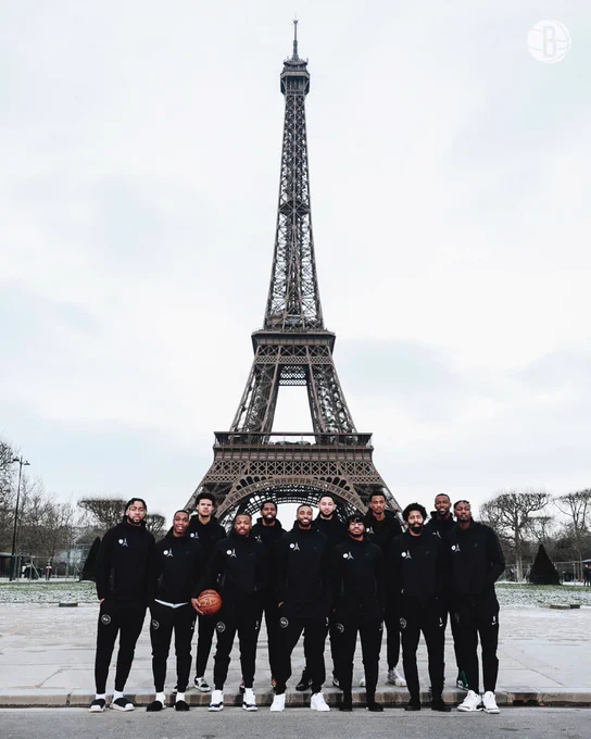 Nets team photo in front of the Eiffel Tower