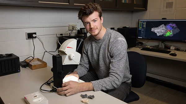 Jordan Crowell, an Anthropology Ph.D. candidate at the CUNY Graduate Center, worked with modern CT scan technology to analyze a picrodontid skull in Brooklyn College’s Mammalian Evolutionary Morphology Laboratory.