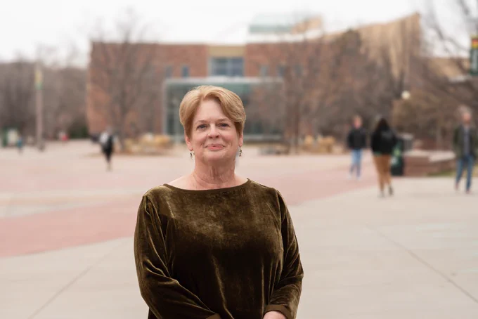 Ann Batchelor posing in the CSU Oval. 