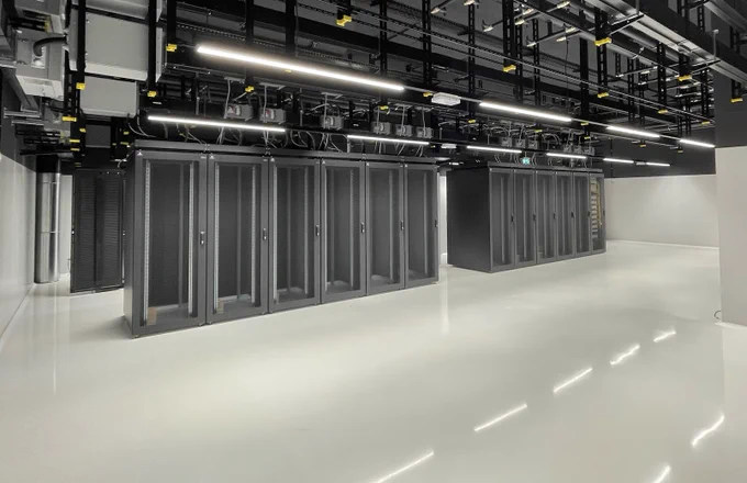 Server room with empty racks (waiting for HPC nodes to be installed).
