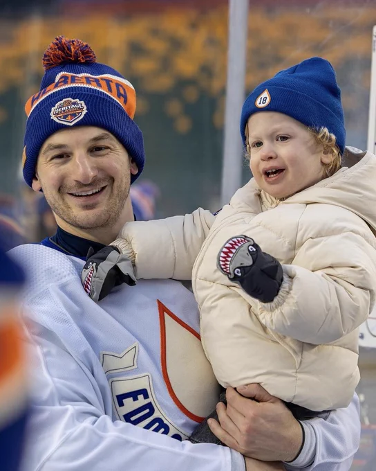 Zach Hyman with his son.