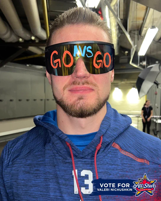 Photo of Val Nichushkin wearing Go Avs Go sunglasses. 
