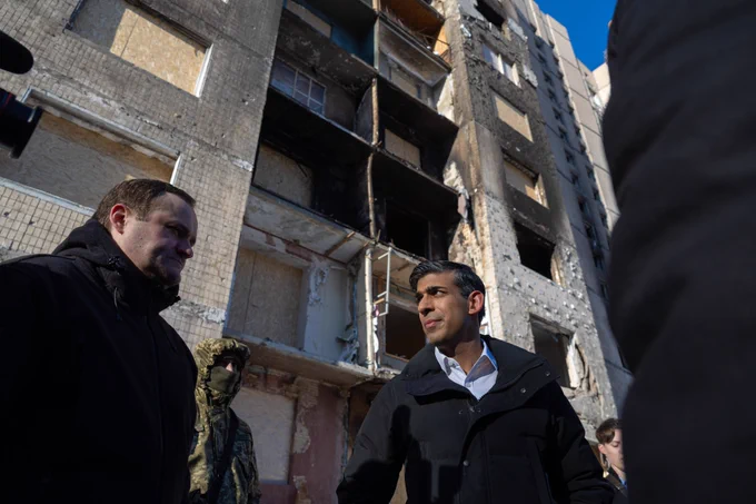 Prime Minister Rishi Sunak visits bombed out buildings in Kyiv.