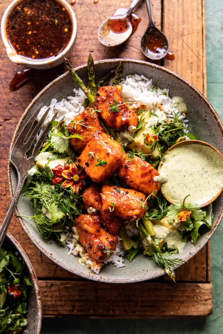 Image of Hot Honey Salmon Bites served fresh off the American Range Kebob Broiler and over rice.