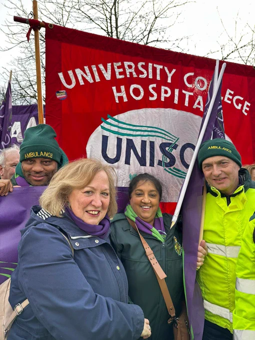 Christina McAnea with UNISON banners and ambulance workers