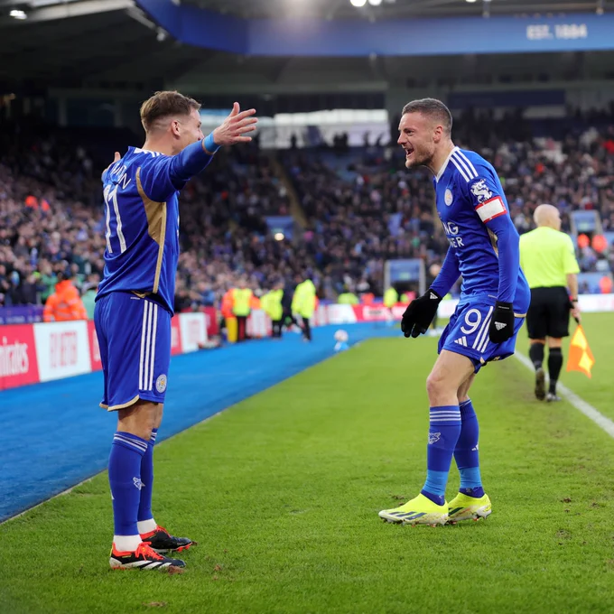 Marc Albrighton and Jamie Vardy celebrate Leicester City's opening goal.
