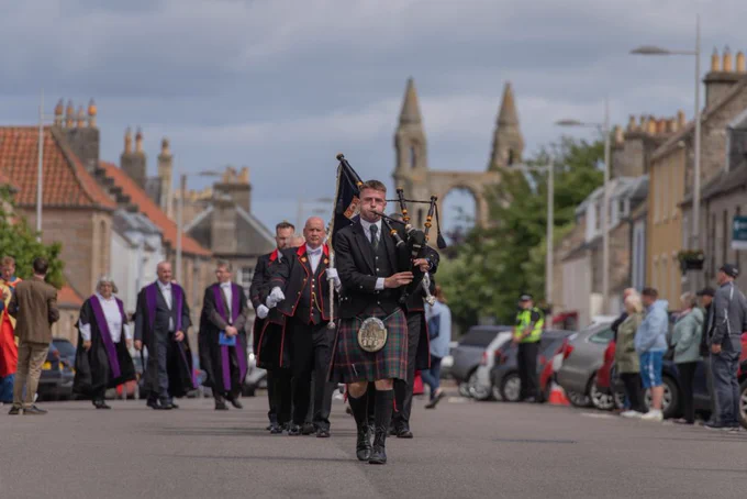Piper leading the University of St Andrews graduation procession