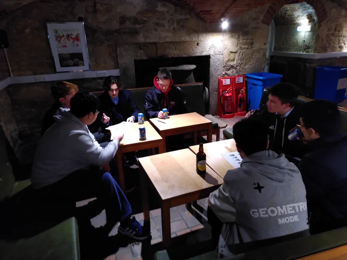 Two teams hard at work answering questions