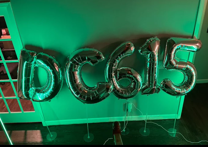 Foil balloons spelling Dc615