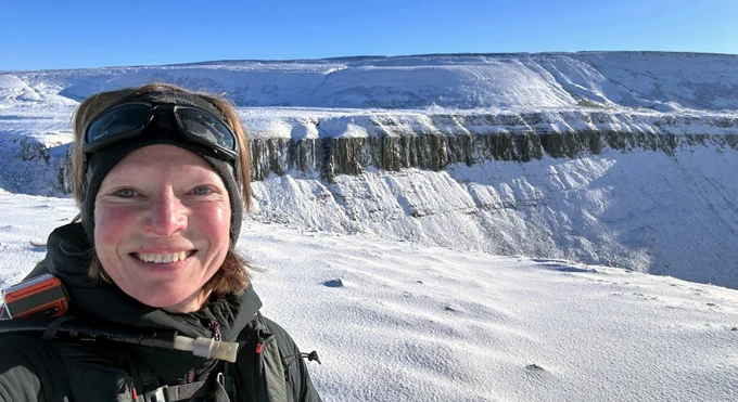 Jennie Stevens with snowy High Cup Nick hills - Photo Jennie Stevens