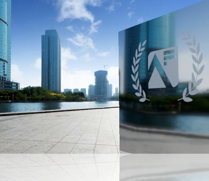 Analysis Function Awards logo on glass award against waterside office skyline. 