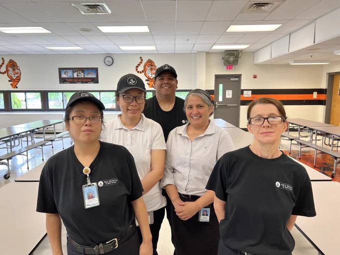 Five PWCS Food and Nutrition team members posing for a photo