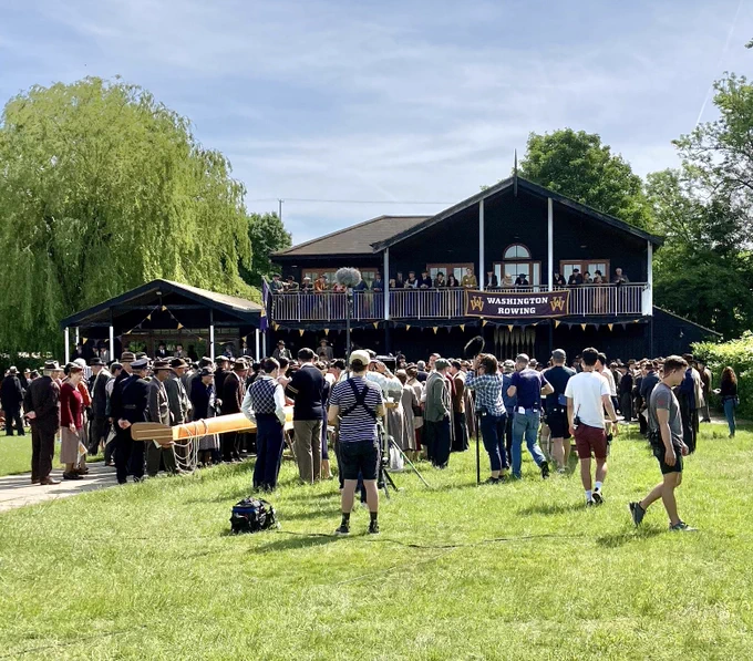Transformed Upper Thames Rowing Club boathouse during filming for The Boys in the Boat with hundreds of extras dressed in clothes for the 1930s