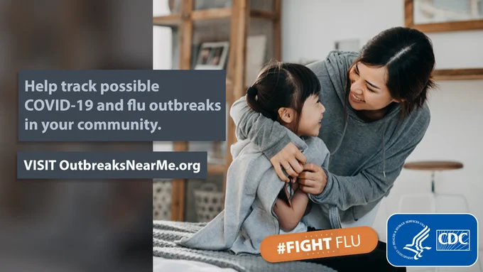An image of a mother holding arms around her daughter. It says “Help track possible COVID-19 and flu outbreaks in your community. Visit OutbreaksNearMe.org” with a #FightFlu band-aid and the CDC logo overlayed on top. 