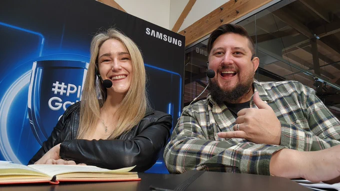 Rachel and Steve wearing headsets and smiling