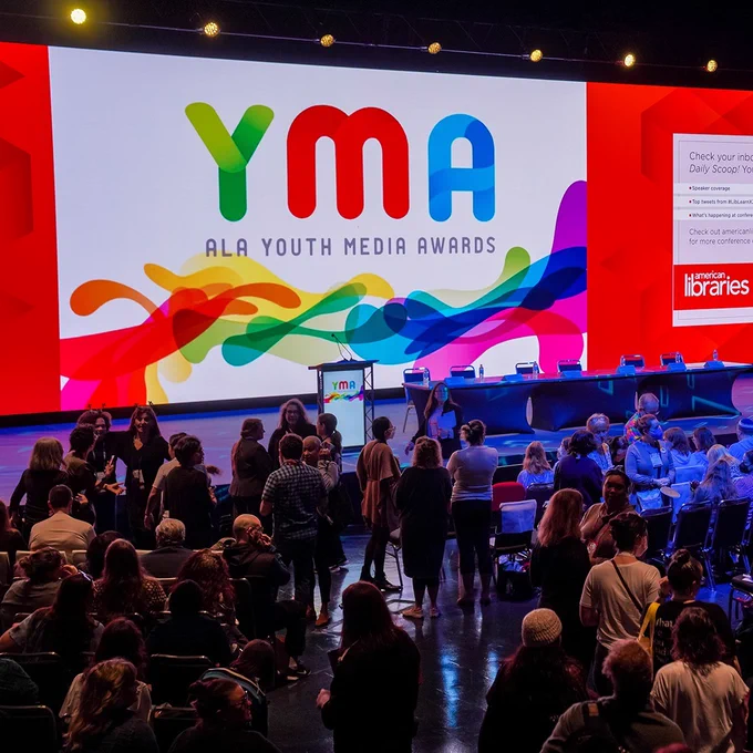 A photo of the crowd waiting for the ALA Youth Media Awards announcements to begin at LibLearnX 2023 in New Orleans.