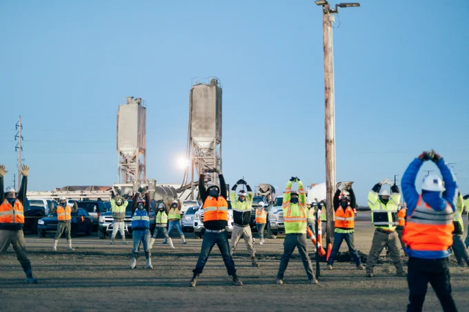 construction team stretching