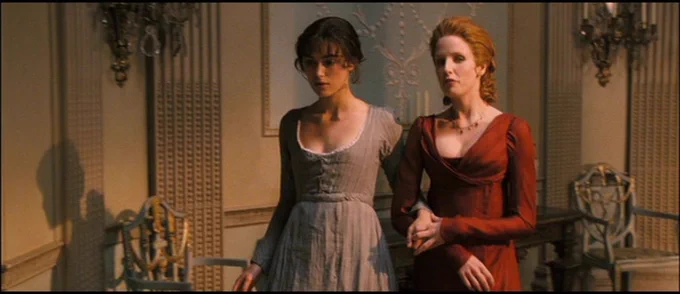 Elizabeth Bennet and Caroline Bingley take a turn about the room in Pride and Prejudice (2005).