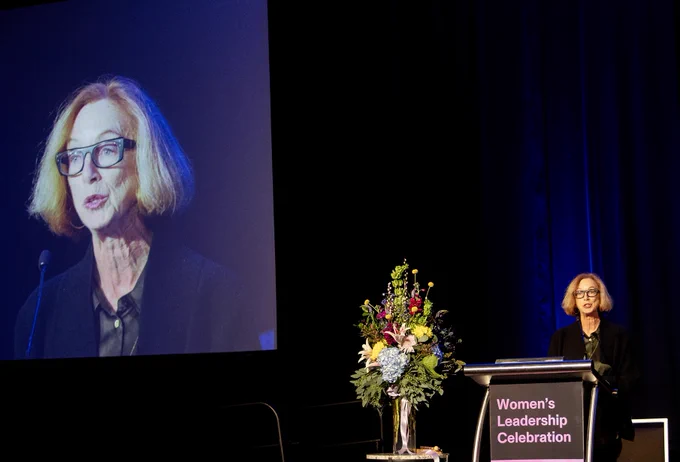 Michelle Satter, founding senior director of the Sundance Institute’s Artist Programs, gives remarks from a stage after receiving the Women’s Leadership Celebration Giving Voice award.