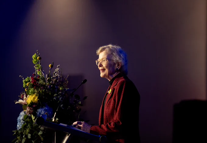 The First Woman President of Ireland, Mary Robinson, gives remarks from a stage after receiving the Women’s Leadership Celebration Global Leadership award.