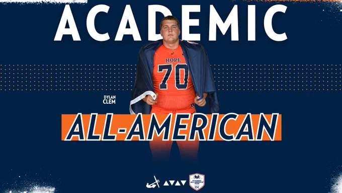 Dylan Clem poses for a portrait in an orange Hope College football uniform.