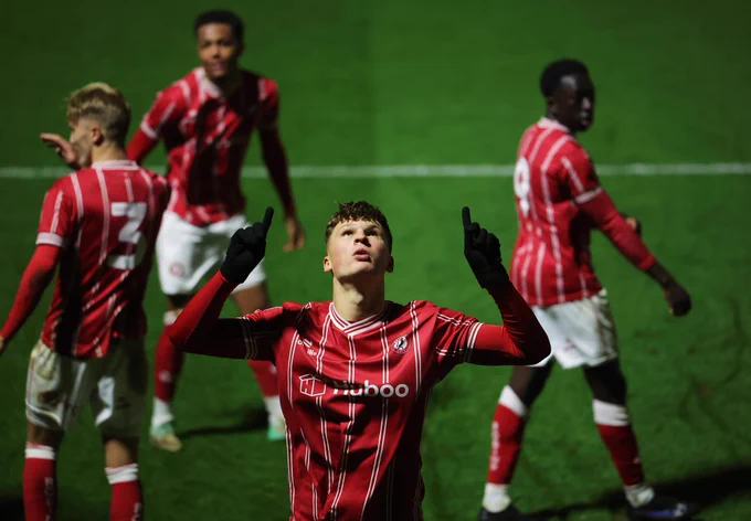 Brandon Bak celebrates scoring a goal.