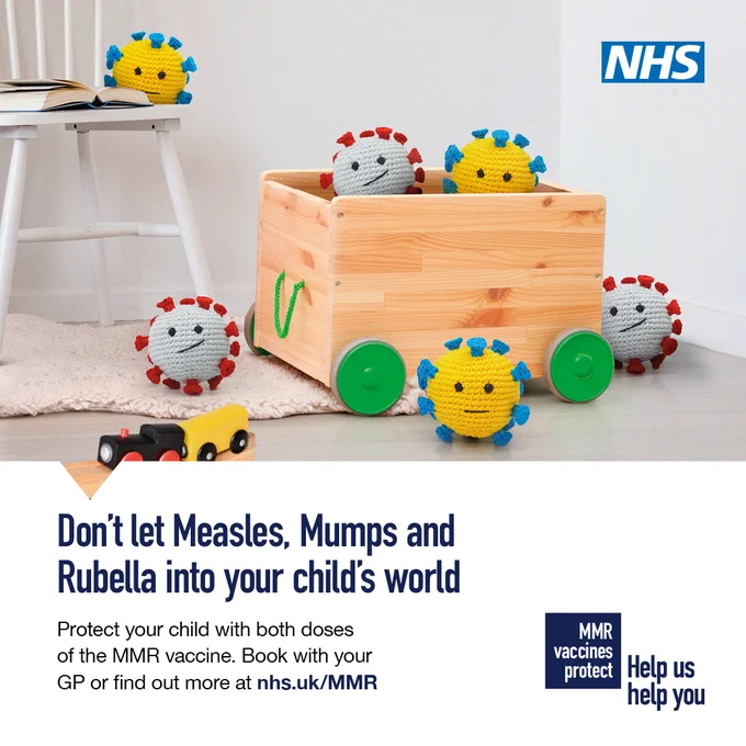 Visual of a wooden toy box with green coloured wheels, surrounded by toys.  The text reads: Don't let measles, mumps and rubella into your child's world.  Protect your child with both doses of the MMR vaccine.  Book with your GP or find out more at nhs.uk/MMR.  MMR vaccines protect.  Help us help you.