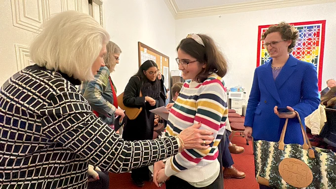 Rep. Mary Morrissey of Bennington 5 congratulates Addie Lentzner after she and other students in Vermont Student Anti-Racism Network testified on their bill H.682 in the House Committee on Education on Tuesday, January 23, 2024. Behind Addie is Will Greer, a junior at Bennington College, and to the right of Addie is Emily (VSARN) and Rep. Elizabeth Burrows of Windsor.