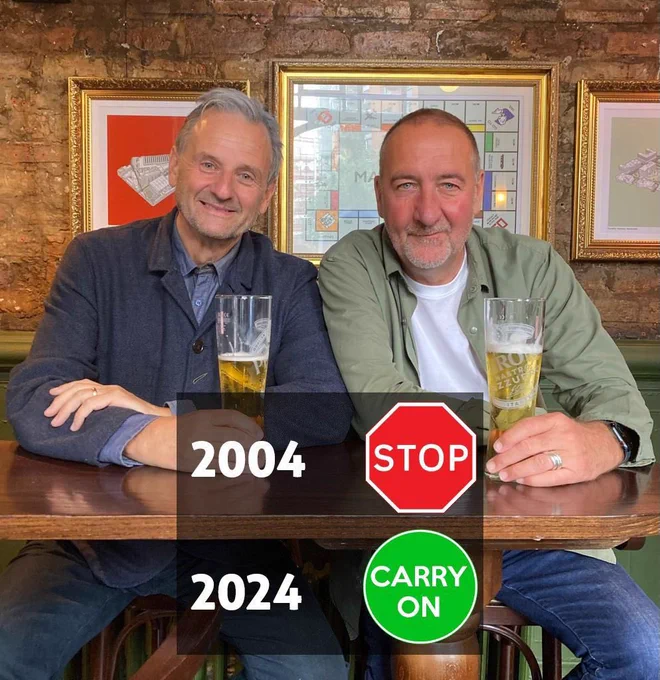 Photo of Mark Radcliffe and Marc Riley having a pint, with a 'Stop' sign beside the year 2004, and a 'Carry On' sign beside the year 2024.