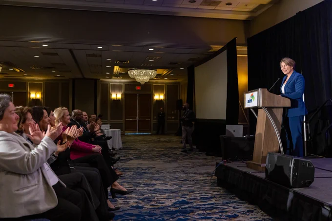 Governor Healey at podium during AIM Address.