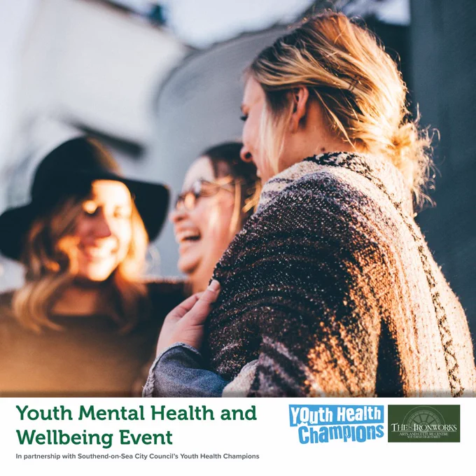Youth Mental Health and Wellbeing Event. Three teenage women laughing together whilst wearing winter clothing