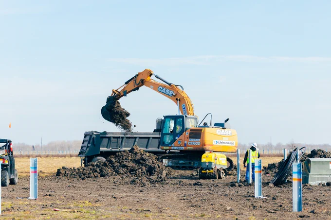 excavator digging dirt
