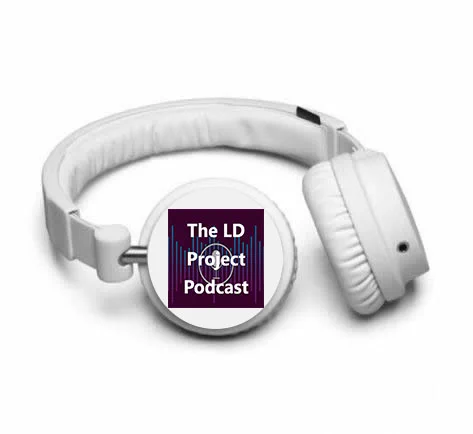 The LD project podcast logo on white headphones