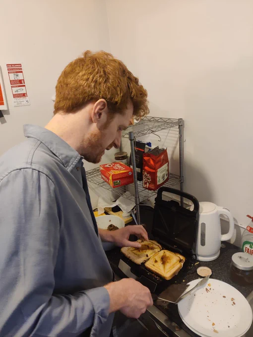 Matthew O'Toole MLA making haggis toasties 