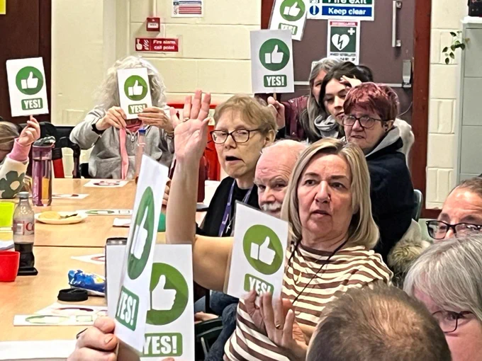 People voting at the event.