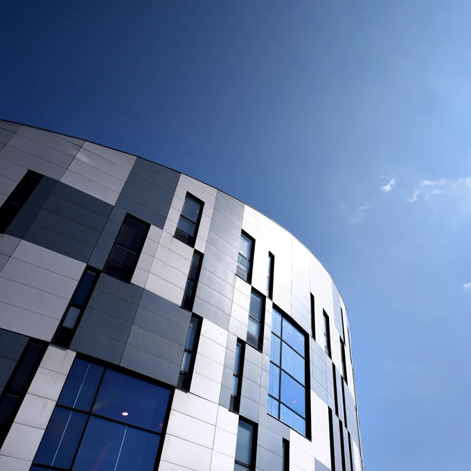 A photo looking up into the sky with the Waterfront Building visible