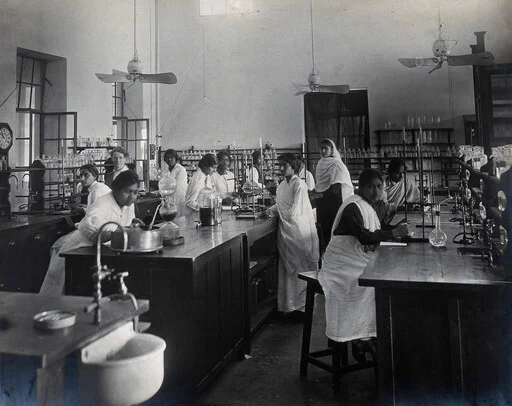 Black and white photograph of women working in a laboratory