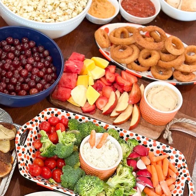 Overhead picture of healthy game-day snacks on a table.