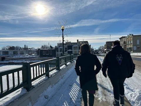 Lt. Gov. Rodriguez walks down the street in Fort Atkinson with Shauna Wessely.