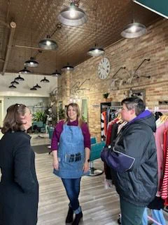  Lt. Gov. Rodriguez talks with a shop owner and Shauna Wessely 