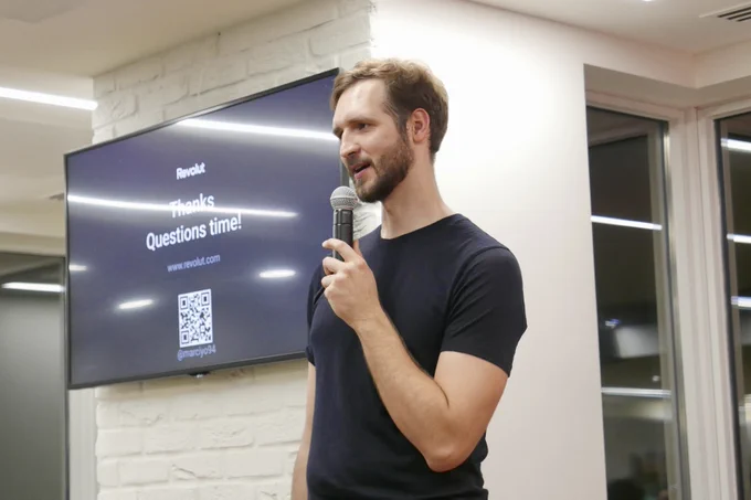 A photo of Marcel Mierzejewski speaking.