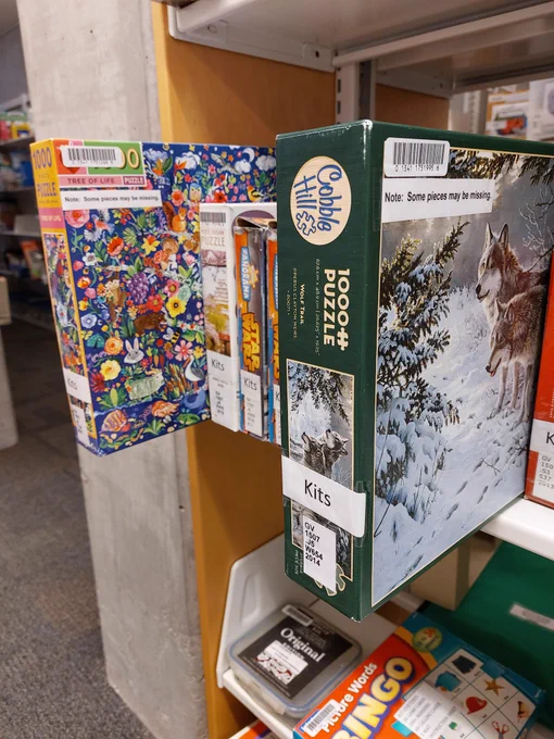 Shelf with several puzzle boxes