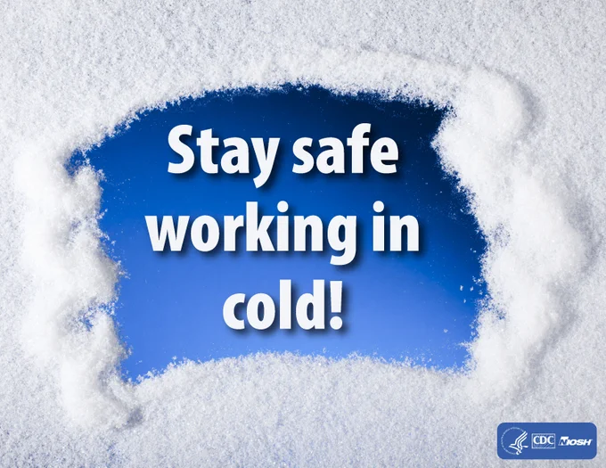 image is a snow-covered window with part of it cleared and in the clearing it says "Stay safe working in cold!"