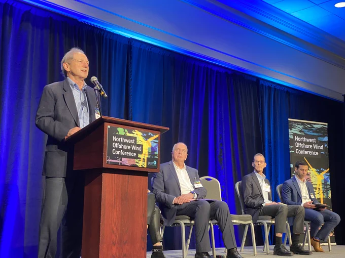 Adam Stern, Executive Director of Offshore Wind California, speaks on the Industry Perspectives on Offshore Wind Energy Markets panel at the 2024 Northwest Offshore Wind Conference, January 30, 2024, in Portland, Oregon. Photo by Aaron Franco / POET