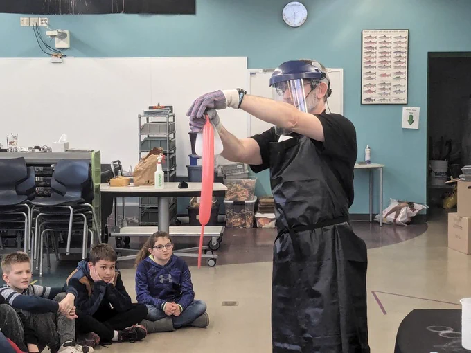 Using gas to blow up a balloon.
