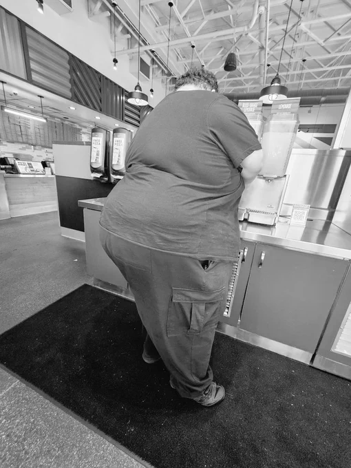 Large overweight man in restaurant