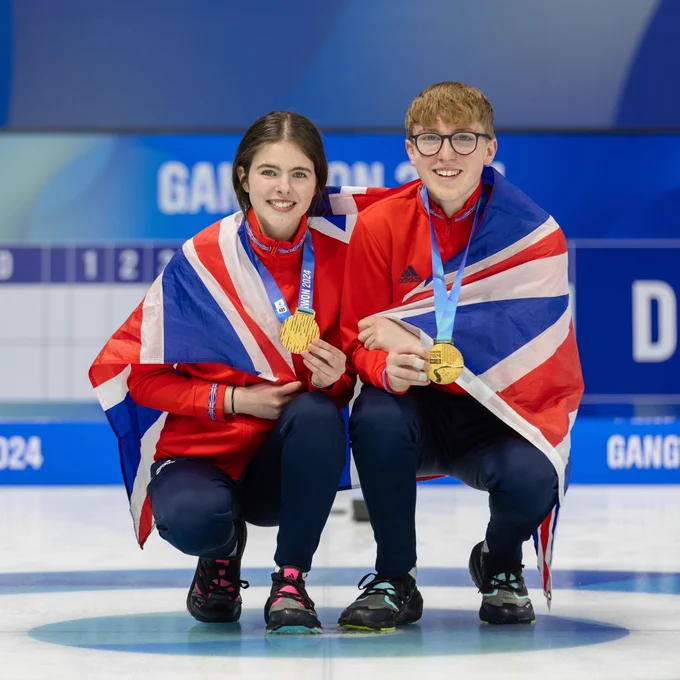 Callie Soutar and Ethan Brewster with their gold medals